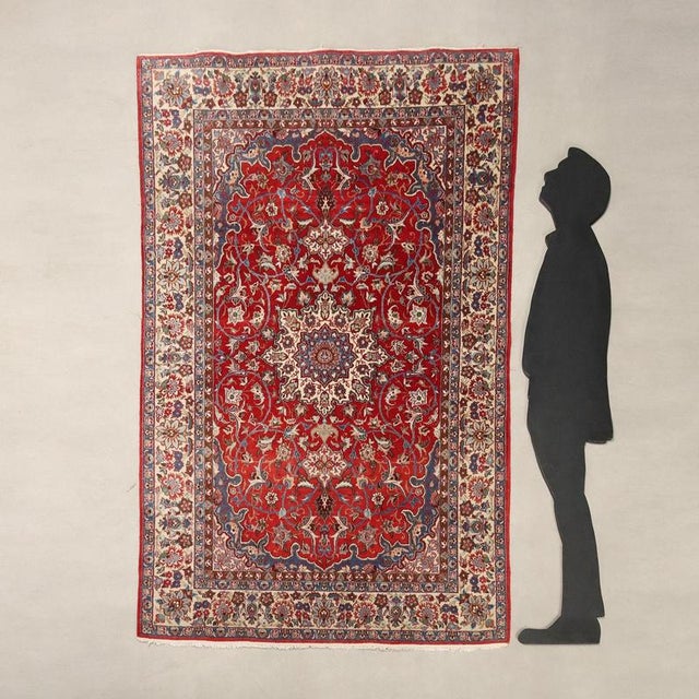 Isfahan rug in cotton and wool, extra-fine knot and hand-made. This piece is attributed to the mentioned designer/maker....