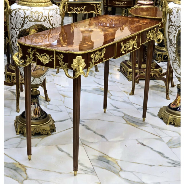 Fall in love with this timeless design. This stunning, French-style console table features a classic, rectangular...