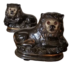19th Century Staffordshire Lions - a Pair