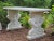 A monumental and finely carved marble center or garden table. Supporting the thick marble top are winged rams holding...