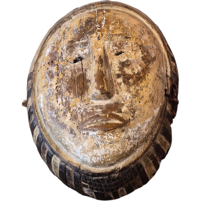Antique Congolese Fang Carved Mask A "fang mask" refers to a type of ceremonial mask created by the Fang people, an ethnic...