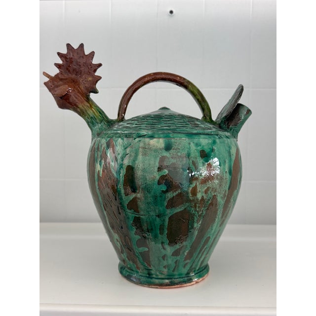 Unique rooster-shaped jug in green and brown glazed majolica ceramic. Made in the 50s/60s. Decorative rooster-shaped jug...
