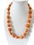 Vintage chunky natural coral necklace featuring polished, graduated beads in warm salmon and beige tones. Each bead...