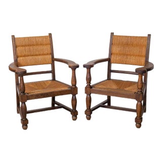 1940s Pair of Carved Wood and Woven Chairs by Charles Dudouyt For Sale