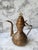 This is a beautifully etched copper coffee pot. It appears to be Middle Eastern Dallah in size and design. Would look...