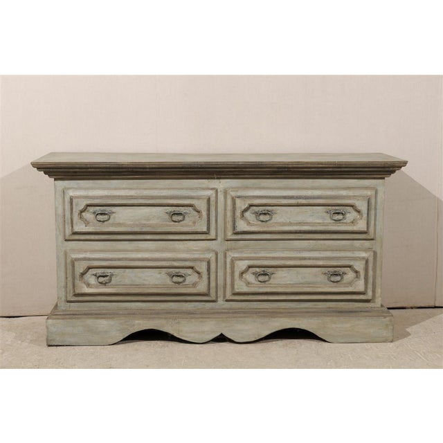 A Large Size Four-Drawer Painted Wood Dresser with Graded Top and Scalloped Base on Three Sides. This handsome chest of...