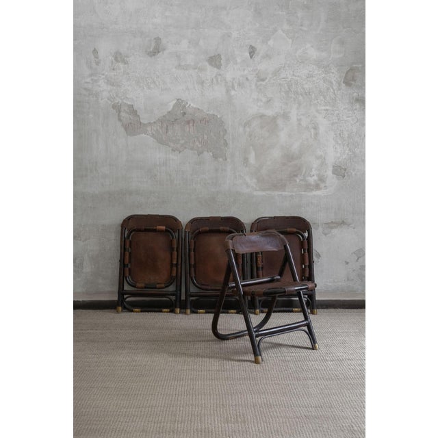 Set of four bamboo and leather chairs by tito agnoli product details dimensions: 57 w × 79 h × 70 d cm this piece is...