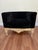 Custom upholstered tub chair in black crushed velvet with an ornate gilt-finished carved wood base, in a Hollywood Regency...