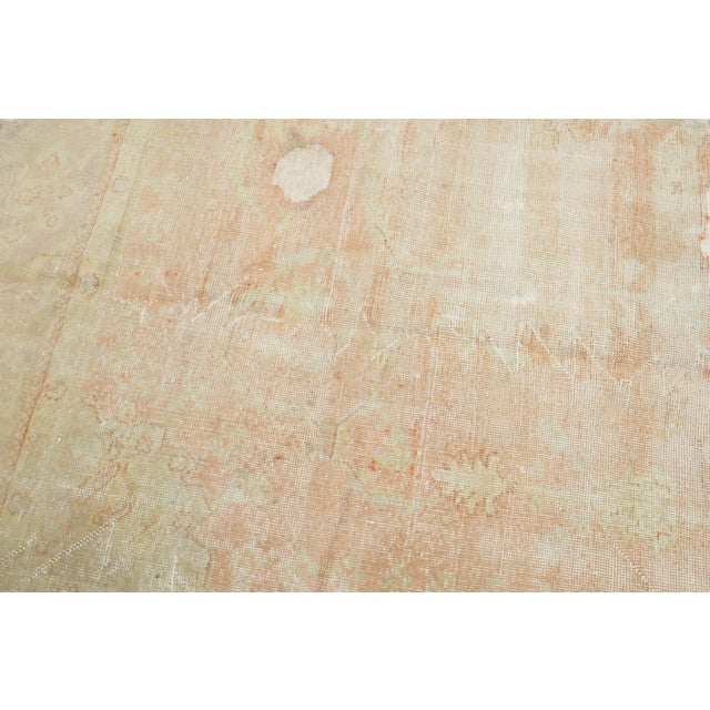An Early 20th Century worn Turkish Oushak in soft orange/peach color. Details rug no. 8726 size 9' 10" x 13' (300 x 396 cm)