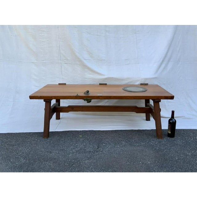 Unique table fabricated from a great old ships door with built in brass porthole with door handle and hinges. Arts and...