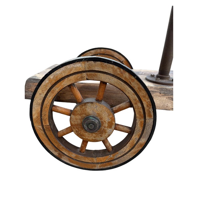 Rustic handcrafted raw edge cedar industrial pipe cart. Perfect for indoors or outdoors. Has handle and functional wheels....