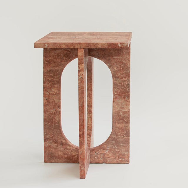 BOND Side Table in Red Travertine - Bond Side Table evokes simplicity with its modern, clean design. Crafted from honed...