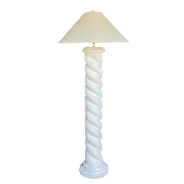 Sculptural plaster floor lamp, a dramatic piece that channels the elemental grandeur of Michael Taylor, the organic whimsy...