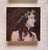 The painting features a serene profile of a woman adorned with a floral crown, capturing a moment of quiet contemplation....
