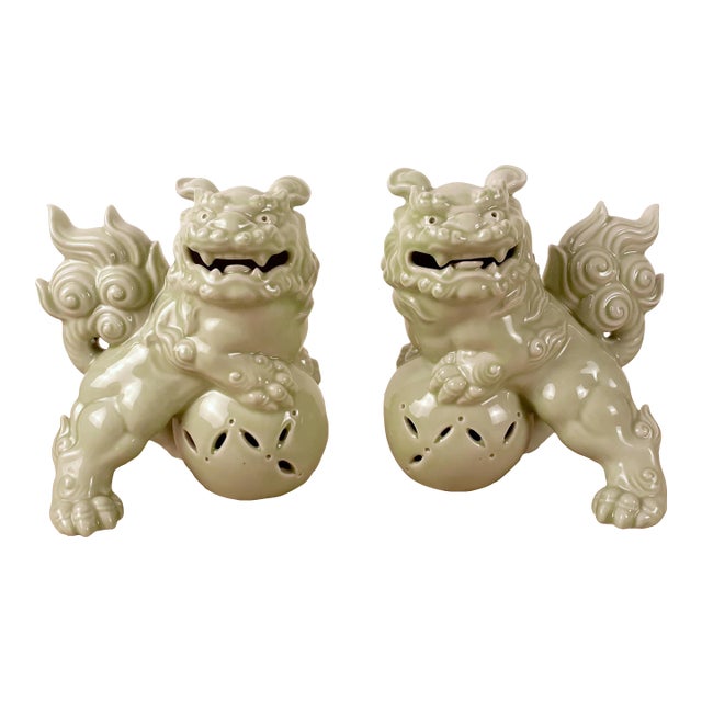 Mid Century Pair of Chinese Celadon Fu Dogs For Sale