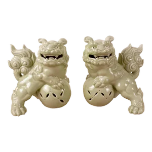 Mid Century Pair of Chinese Celadon Fu Dogs