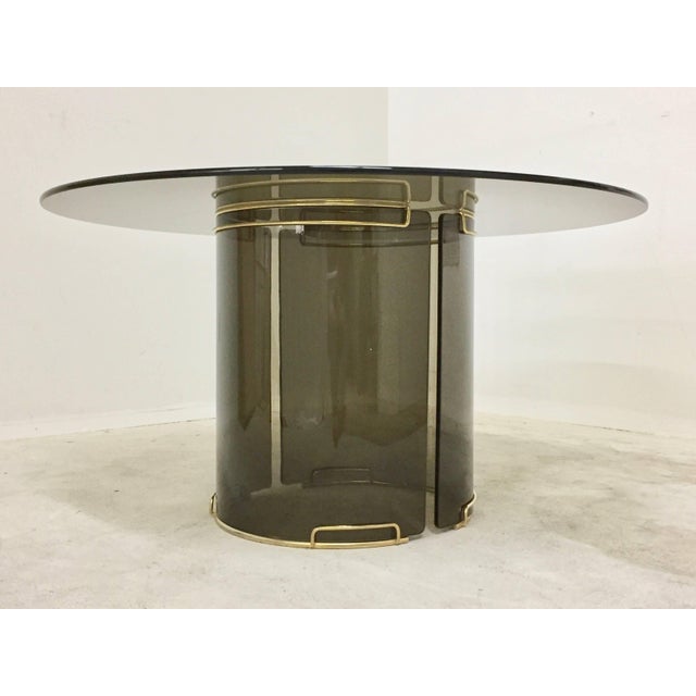 Round Grey Smoky Glass Dining Table with Curved Glass Base and Brass