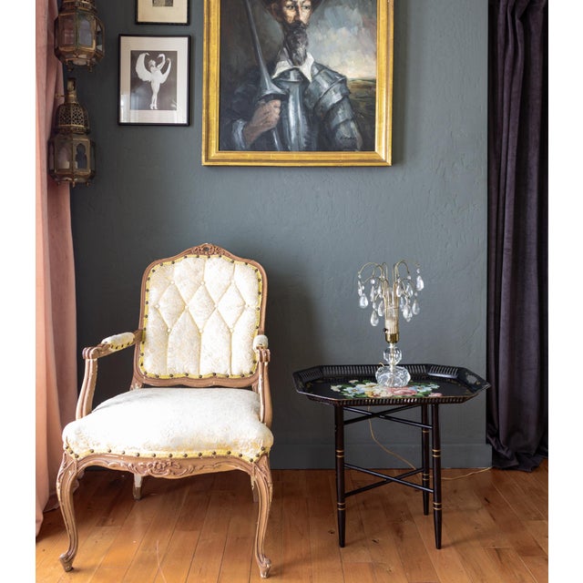 This lovely toleware tray table features hand-painted florals and foliage in butter yellow, baby blue, light pink, and...