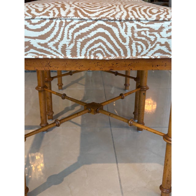 Beautiful pair of vintage 1970s faux bamboo wood benches or ottomans. These have all new upholstery including new wood,...