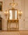 A refined 1950 French Louis XVI-style console and mirror set, beautifully crafted from hand-carved beech wood with a...