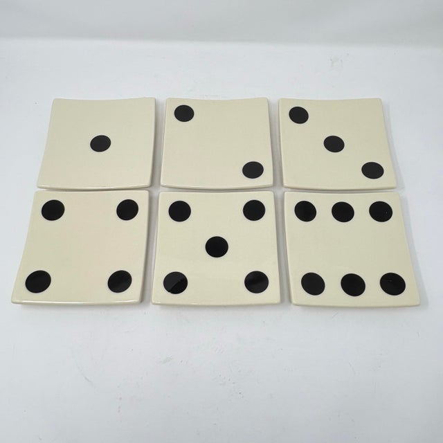 A set of six 5.25-inch ceramic hors d’oevres plates by Restoration Hardware. All original packaging.