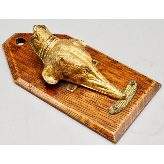 A nice quality 19th-Century English note or message clip in the form of a figural greyhound or whippet dog. It is hand...