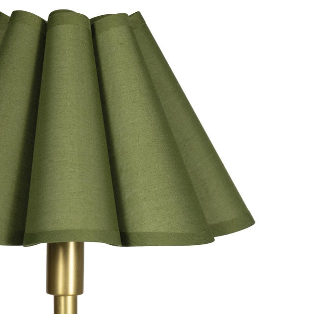 The Polly Floor Lamp exudes timeless elegance with its two scalloped shades, casting a soft, comforting glow that enhances...
