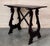 19th century Spanish trestle table in walnut. This piece has a great scale, lovely carved lyre legs and beautiful ebonized...