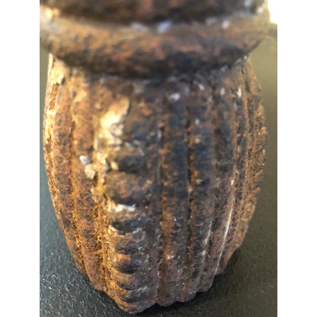 Excellent patina antique window weight. Adds a feminine softness amongst curiosities.