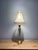 A refined and elegant Lenox for Quoizel table lamp showcasing the timeless sophistication of neoclassical design. Crafted...