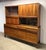 A fabulous mid century modern two-piece credenza plus hutch made by American of Martinsville circa 1960’s. Contrasting...