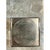 This vintage geometric wall panel presents a hypnotic square mirror etched with dozens of tightly spaced concentric...