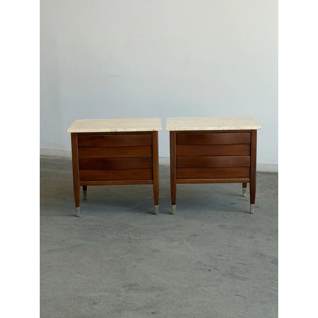 W24 D18 H23 A beautifully crafted pair of vintage American of Martinsville nightstands featuring warm walnut cases topped...