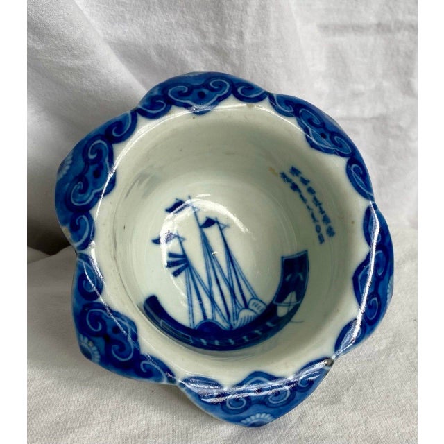 A finely potted late Qing to early Republic period blue and white porcelain bowl in an elegant six-lobed, flower-form...