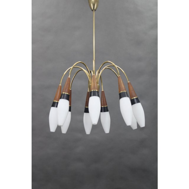 - cleaned and rewired - 9x , e12-e14 bulbs - us wiring compatible this piece is attributed to the mentioned...