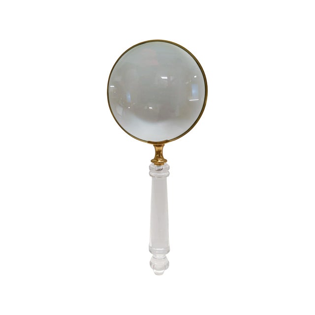 The smooth, elongated handle adds a touch of classic luxury, while the polished metal detailing enhances its elevated...