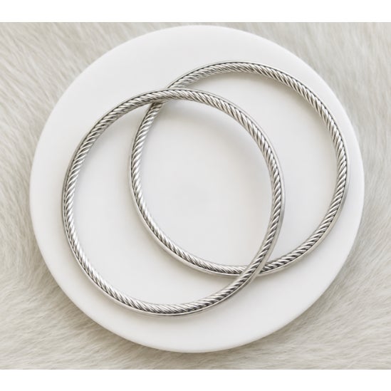 A rare David Yurman Inside-Out Cable bracelet set of 2, sterling silver, discontinued, sculptural, iconic design. This...