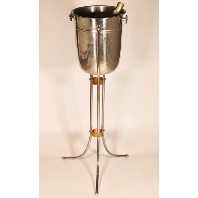 A superb Art Deco champagne ice bucket and stand. The champagne bucket is removable. This could be a plant stand or...
