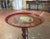 Decorate a coffee table, bar, or console with this richly colored antique French tôle tray, crafted circa 1870. Circular...
