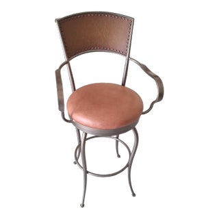 Artistica Home Swivel Metal Dining Chair With Armrests and Brown Upholstery For Sale