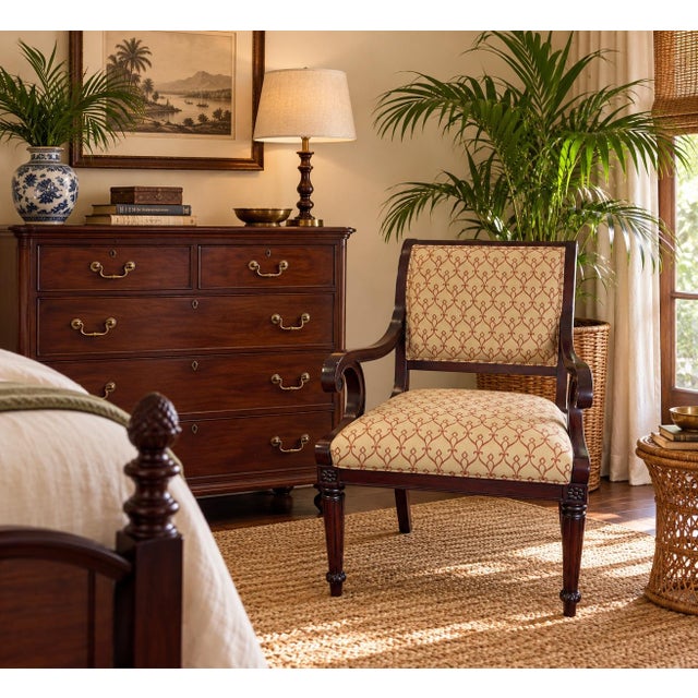 This Drexel Heritage arm chair features the classic Empire or Regency style. characterized by its elegant mahogany frame,...