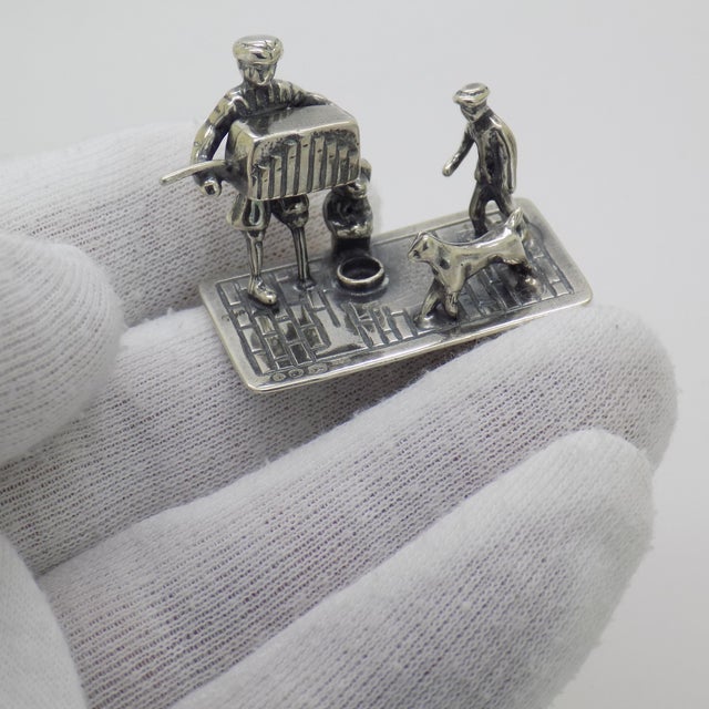 A captivating vintage miniature depicting a street artist scene, handmade and likely dating from the 1940s to 1950s. This...