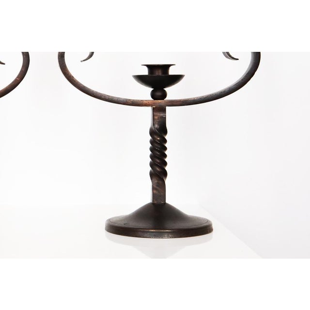 This beautiful pair of early 20th Century candleholders, signed by Charles Piguet, are crafted from wrought iron,...