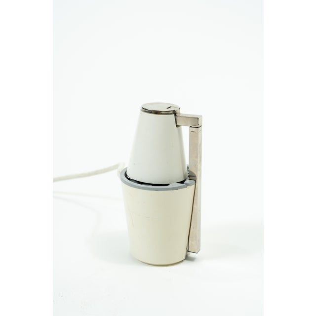 Adjustable Travel Lamp by Eichhoff, 1970s, in Very Good conditions. Designed 1970 to 1979 This piece has an attribution...