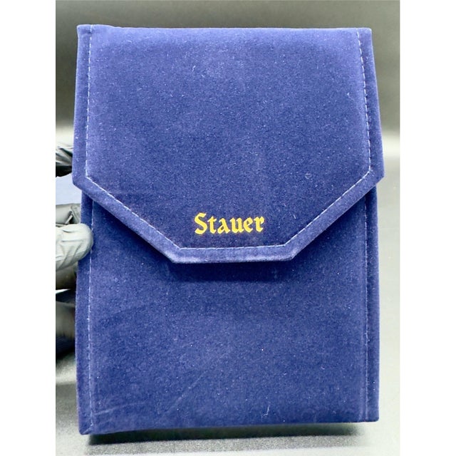 Beautiful vintage STAUER set, never opened and used. This set features a teardrop-shaped pendant necklace, pendant...