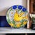 Antique ceramic plate, made in the potteries of Manises (Valencia) with the yellow bird and surrounded by flora,...
