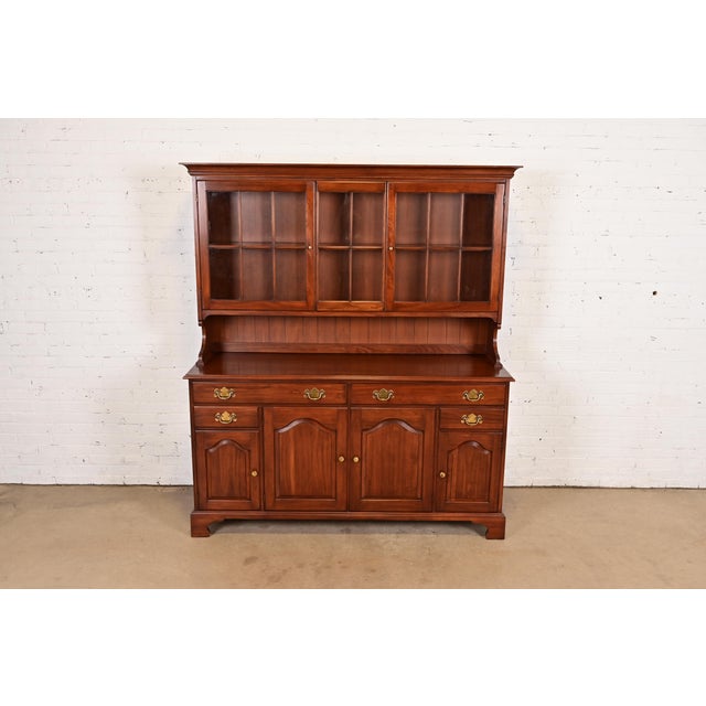 A gorgeous American Colonial or Chippendale style breakfront, sideboard, or buffet server with hutch top By Henkel Harris...
