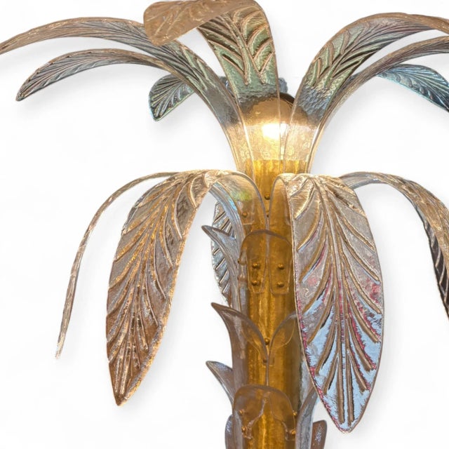 Spectacular, large Murano glass palm-shaped floor lamp. Its Italian design is inspired by the 1950s. Transparent Murano...