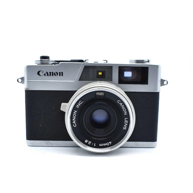 Infuse your bookshelf, office, or gallery wall with a touch of mid-century mechanical elegance. This Canon Canonet 28,...