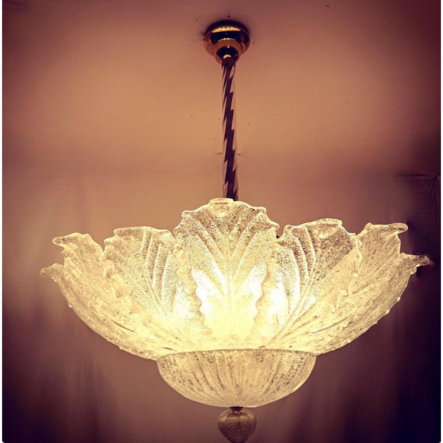 A fantastic item of mid century modern decor, created in the legendary "barovier i tosso-murano" workshops, most sought...